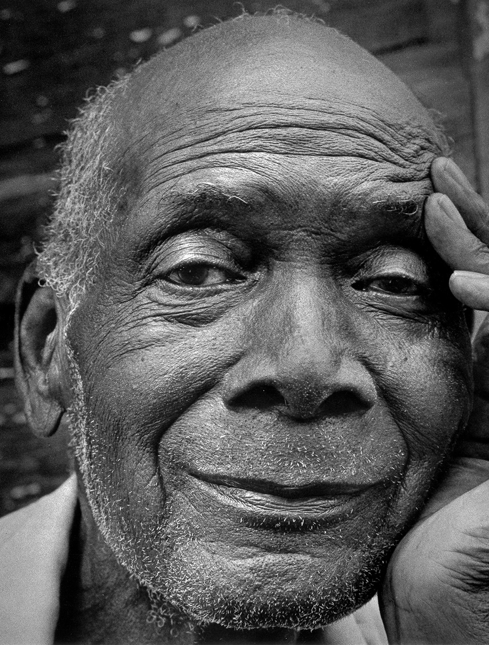 July 2013 cover of The Sun. Close-up of a seventy-eight-year-old man's face as he sits on his front porch in Texas. He is looking into the camera with a slight smile.